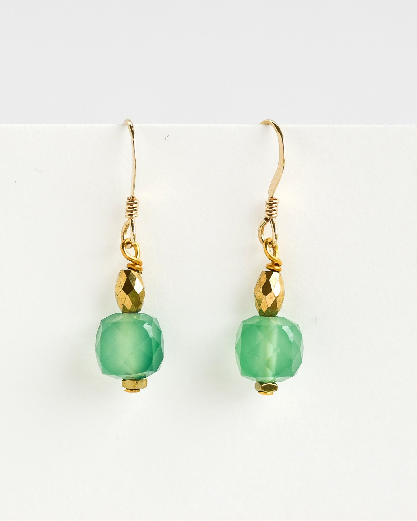 Green gemstone & gold earrings