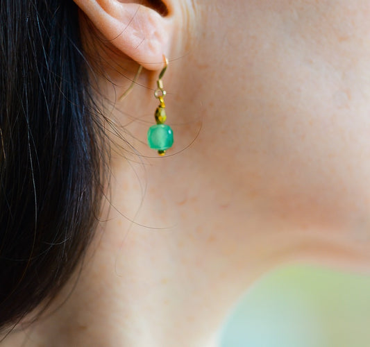 Green gemstone & gold earrings