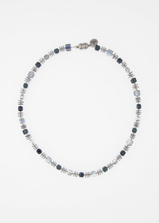 A necklace with alternating hematite slices and other beads, finished with a stainless steel magnetic clasp.