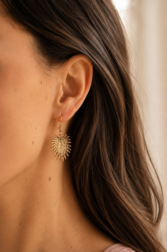 Gold plated steel palm leaf drop earrings