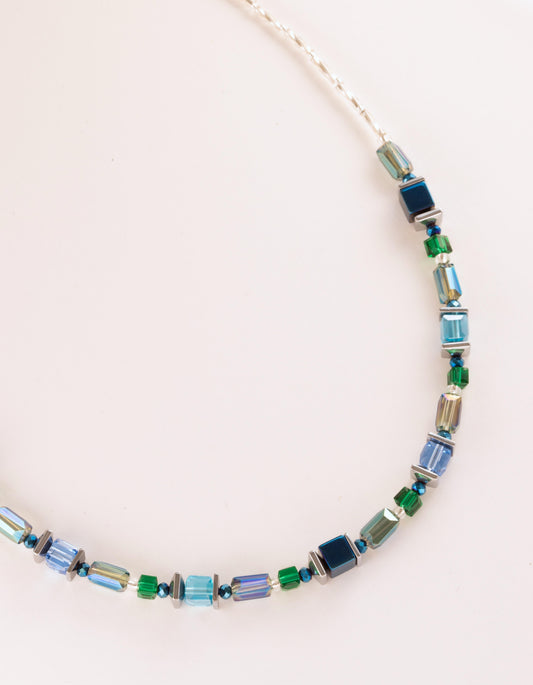 Glass and metallic blue cube necklace