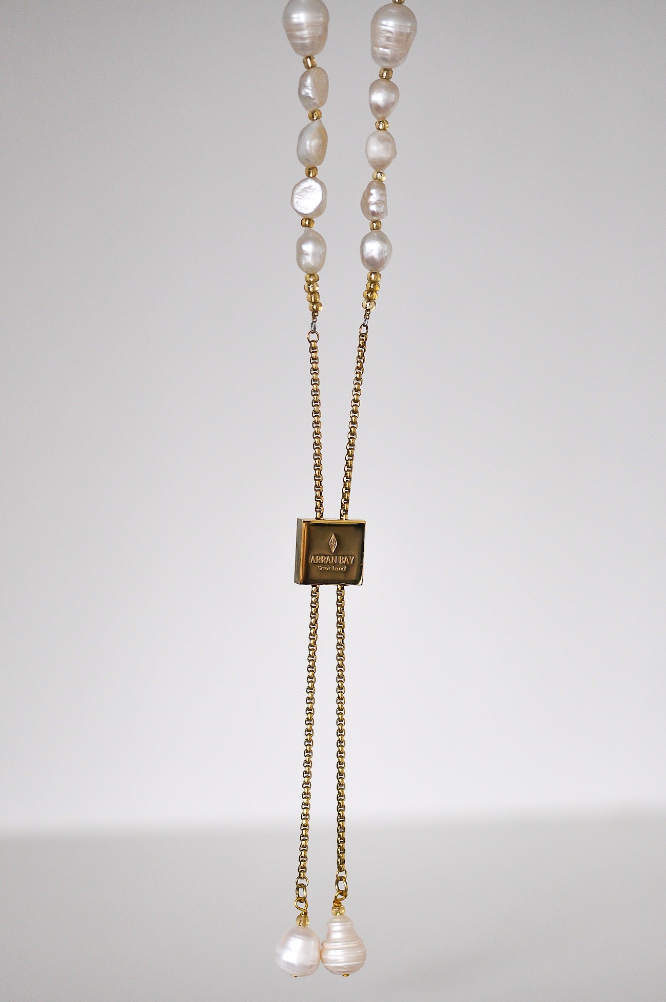 Long pearl slide toggle necklace