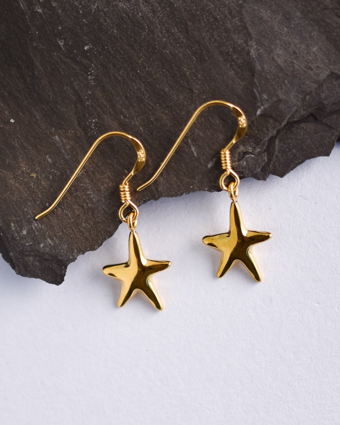 Gold starfish earrings