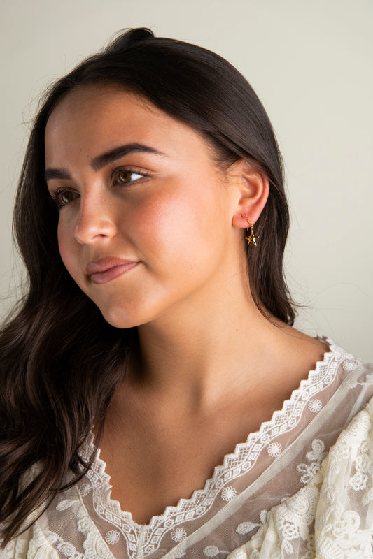 Gold starfish earrings