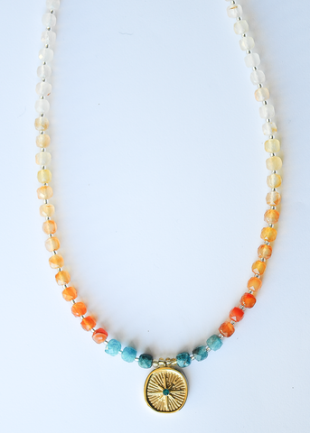 Gold compass pendant necklace