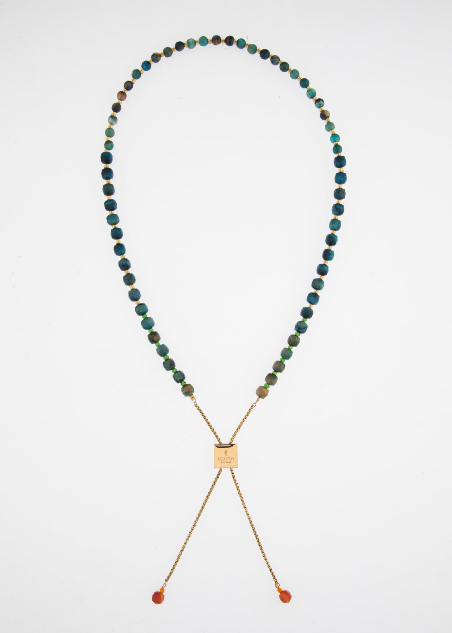 Necklace with multicolored beads and a gold clasp on a white background